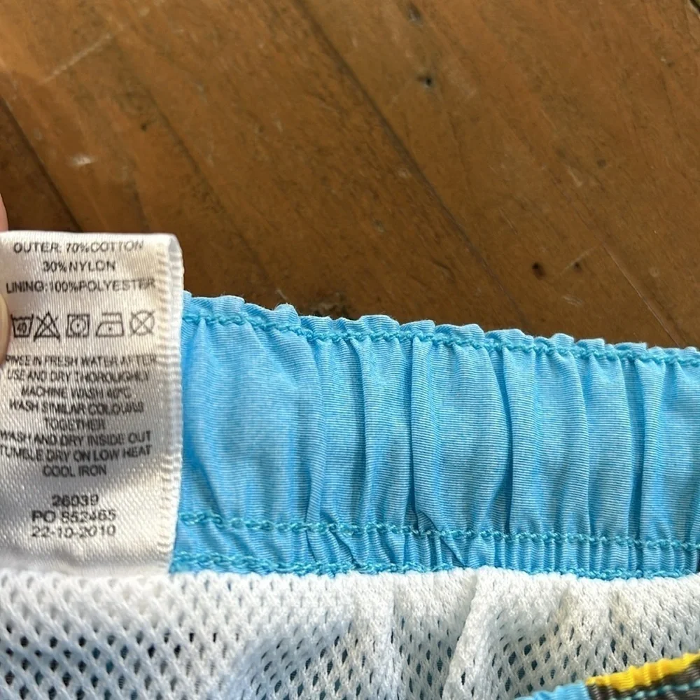 Mini Boden surfing dog swim trunks